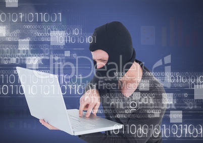 Hacker with hood using a laptop in front of 3D blue background