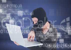 Hacker with hood using a laptop in front of 3D blue background