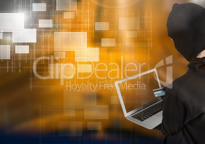 Woman hacker holding a credit credit while using a laptop in front of yellow background