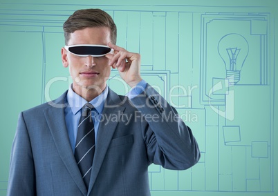 Business man in virtual reality headset against blue and aqua hand drawn wall with pictures