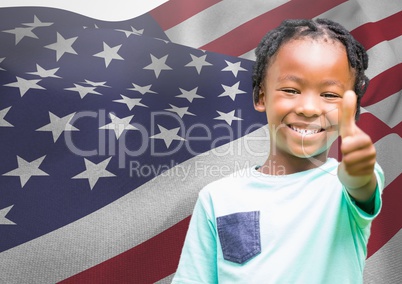 Children with thumb up against american flag