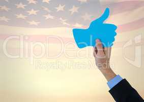 Business man hands holding a 3D thumb up againts american flag