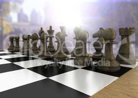 3d Chess pieces against blurry background with flares