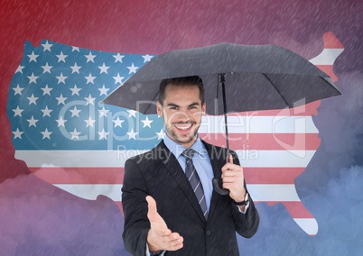 Business man holding umbrella and shaking his hands against 3d american flag