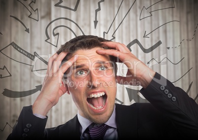 Frustrated business man against blurry wood panel and 3D arrow graphics