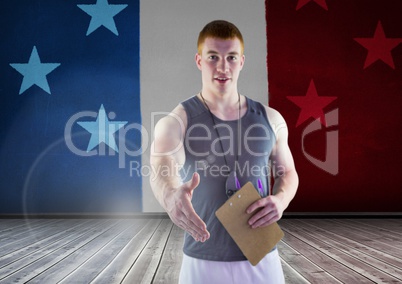 Sport coach shaking his hand against american flag