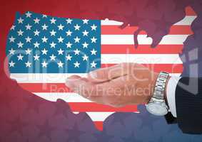 Hand of a business man against american flag