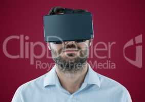 Man in virtual reality headset against maroon background