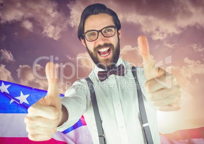 ThBusiness man with thumbs up against american flag