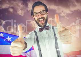 ThBusiness man with thumbs up against american flag