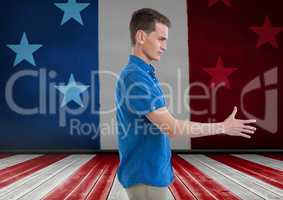 Man shaking his hand against american flag