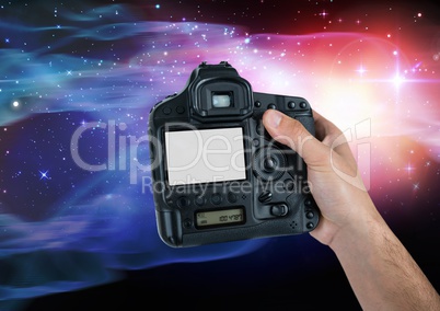 Part of a photographer taking picture against colorful background