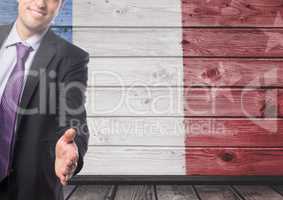Business man shaking his hands against french flag