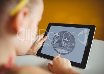 Girl using a tablet with travel icon on the screen