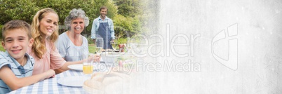 Family at table for bbq and white grunge and copy space transition