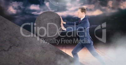 Man pushing 3D rolling round rock