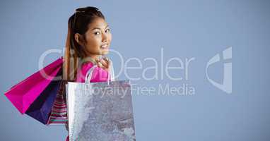 Shopper with bags looking over shoulder against purple background 3d