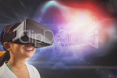 Happy girl in VR headset looking up against black, purple and red galaxy background