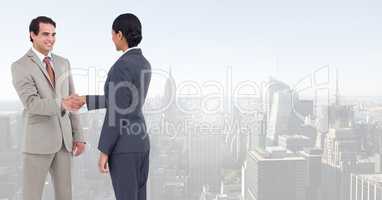 business people greeting in cityscape