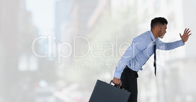 businessman running in cityscape