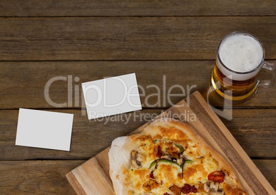 Bussiness cards on wooden desk with food and copy space