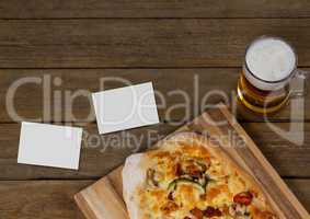 Bussiness cards on wooden desk with food and copy space
