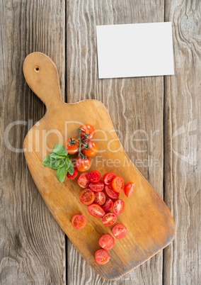 Bussiness card on wooden desk with food and copy space