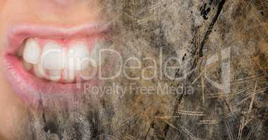 Close up of frustrated woman's mouth and brown grunge transition
