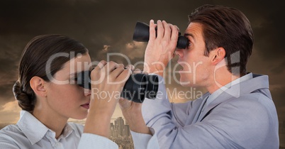 Woman and Man with binoculaurs in cityscape