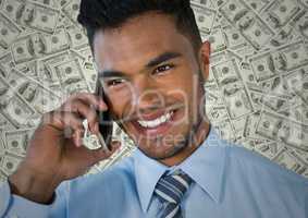 Close up of business man on phone against money backdrop
