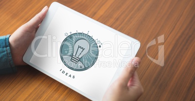 Person holding a tablet with education icon on the screen
