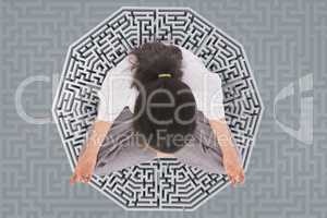 Woman meditating on a 3D maze