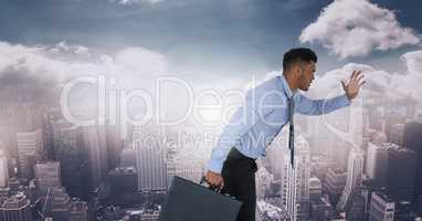 businessman running in cityscape