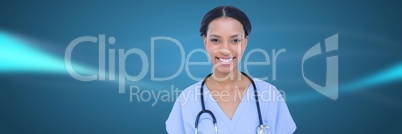 Doctor against blue blurred abstract background