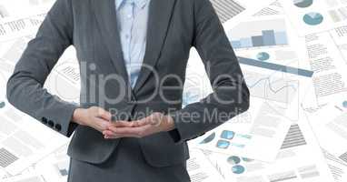 Business woman mid section with hands together against document backdrop