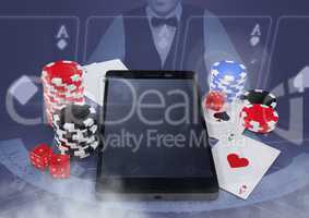 Phone with poker casino chips and playing cards  with croupier and copy space