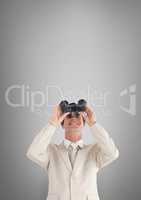 Happy man looking through binoculars against white background