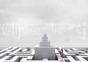 Woman looking up on a 3d maze against a sky with clouds