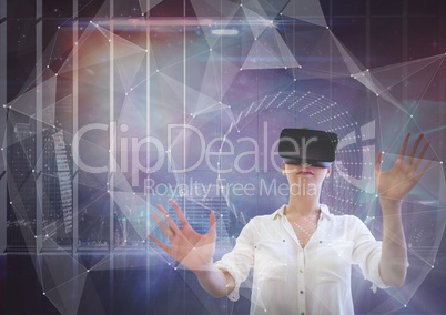 Woman in VR headset touching interface against galaxy city background