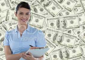 Business woman with clipboard against money backdrop