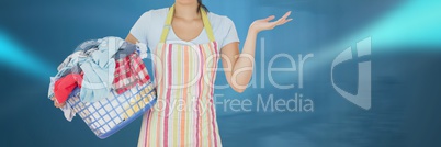 Cleaner  holding laundry basket with bright background