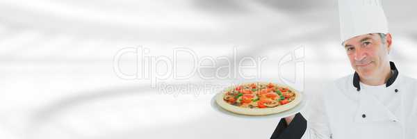 Chef holding pizza with blurred background