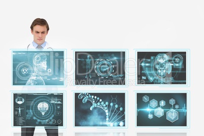 Man doctor interacting with medical interfaces against white background 3d