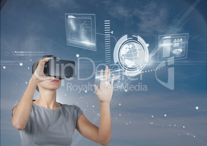 Woman in VR headset touching interface against blue sky with stars