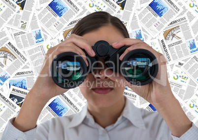 Close up of business woman with binoculars against document backdrop