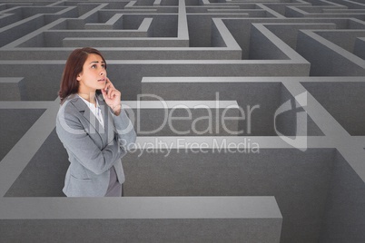 Woman thinking in a 3d maze