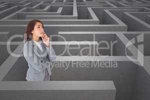 Woman thinking in a 3d maze