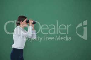 Woman looking through binoculars against green background 3d