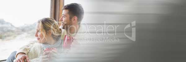 Couple with red mugs looking out window and blurry grey transition 3d