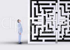 Man looking up to a maze 3d